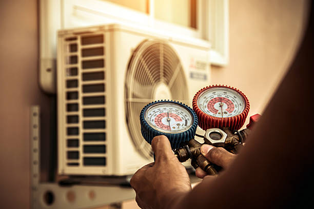 Professional Heat Pump Repair technician working in Avilla, IN